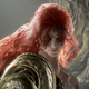 A red-haired woman with blotchy eyes waits for battle.